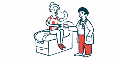 A clinician hands a glass of water to a patient, seated on an examining table, who's taking a pill.