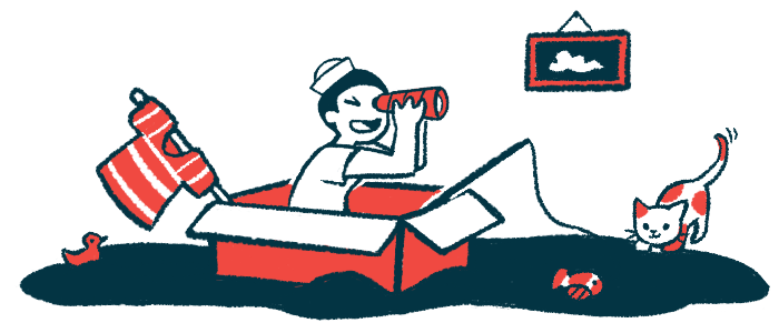 A child wearing a sailor's hat and using a T-shirt as a sail uses binoculars while sitting in a boat made from a cardboard box.