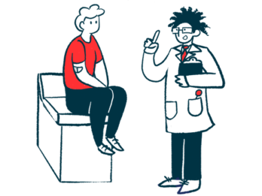 A doctor speaks to a patient seated on an examination table.