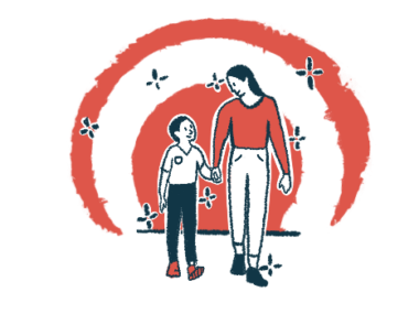 A woman and a boy look at each other and hold hands as they walk.